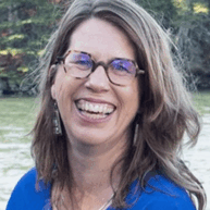 Photo of Corrie Melanson (she/they)